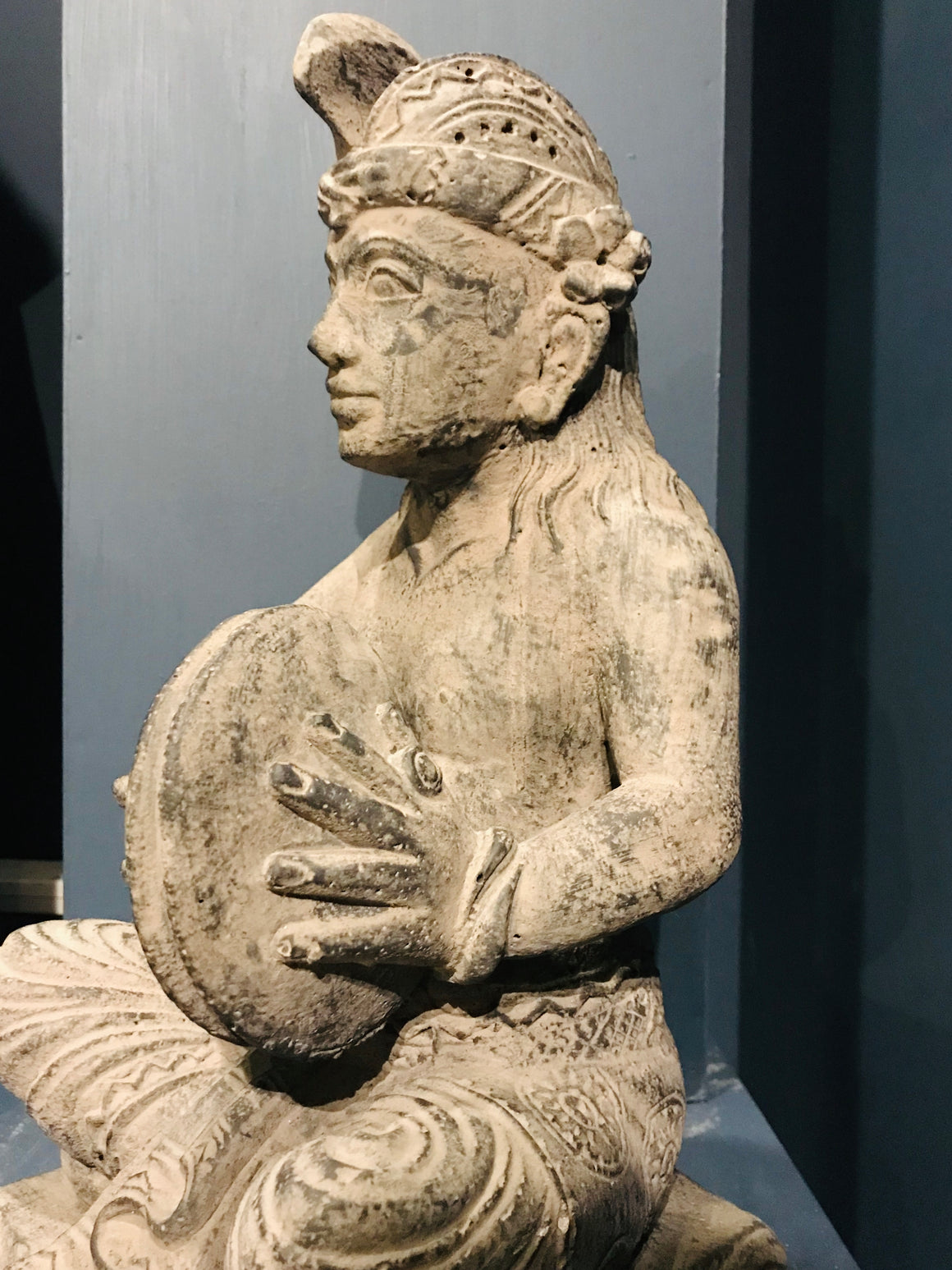 Old Carved Lava stone Musician figure from Merapi in Central Java